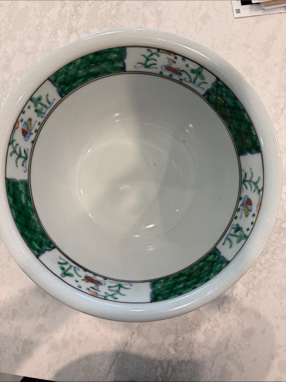 White Ceramic Bowl with Green Patterned Rim